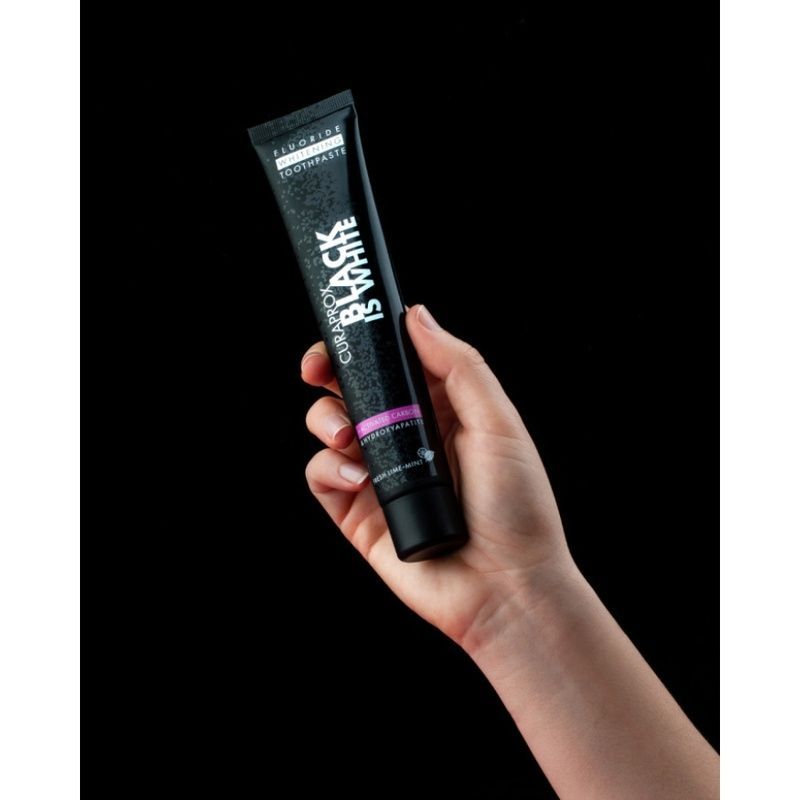 Відбілююча зубна паста Curaprox Black is White, 90 мл 7612412423822 фото